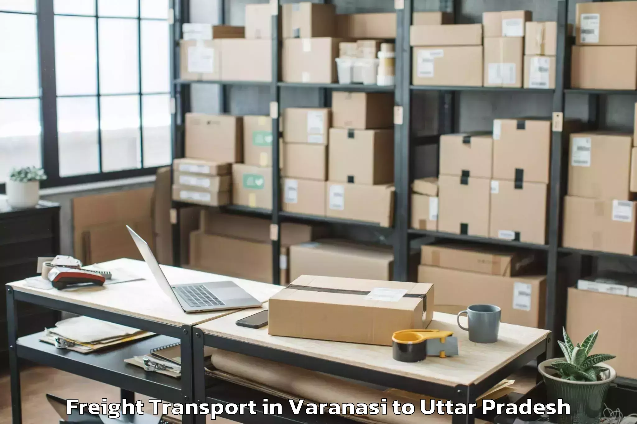 Book Varanasi to Bajna Freight Transport